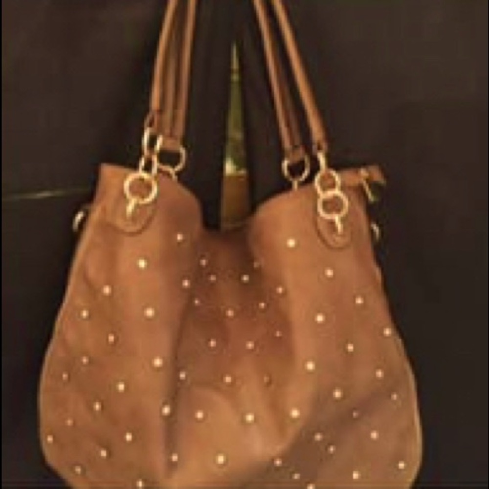 Brown hobo bag with rhinestone embellishments.